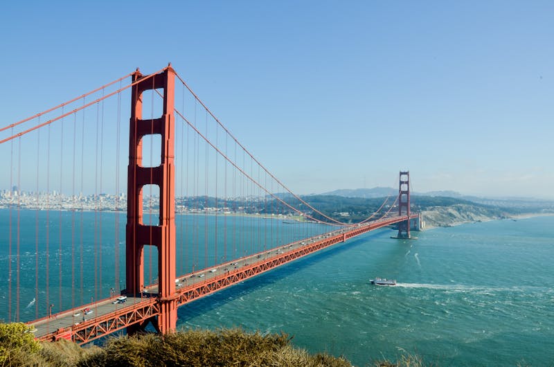 San Francisco Golden Gate Bridge representing the city with the highest IHSS pay rate in California at $23 per hour
