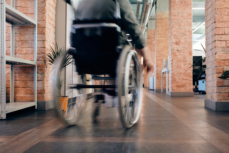 Transit driver assisting a passenger boarding an accessible vehicle