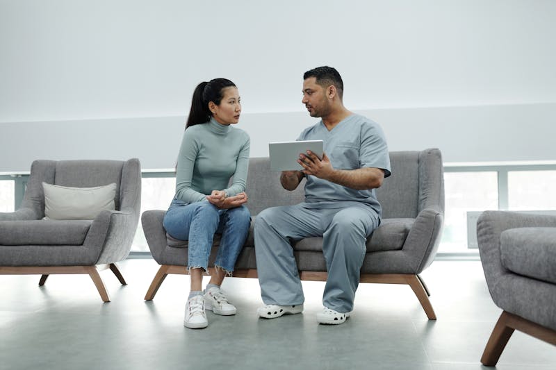 Telemedicine session in a rehabilitation setting showing remote care technology