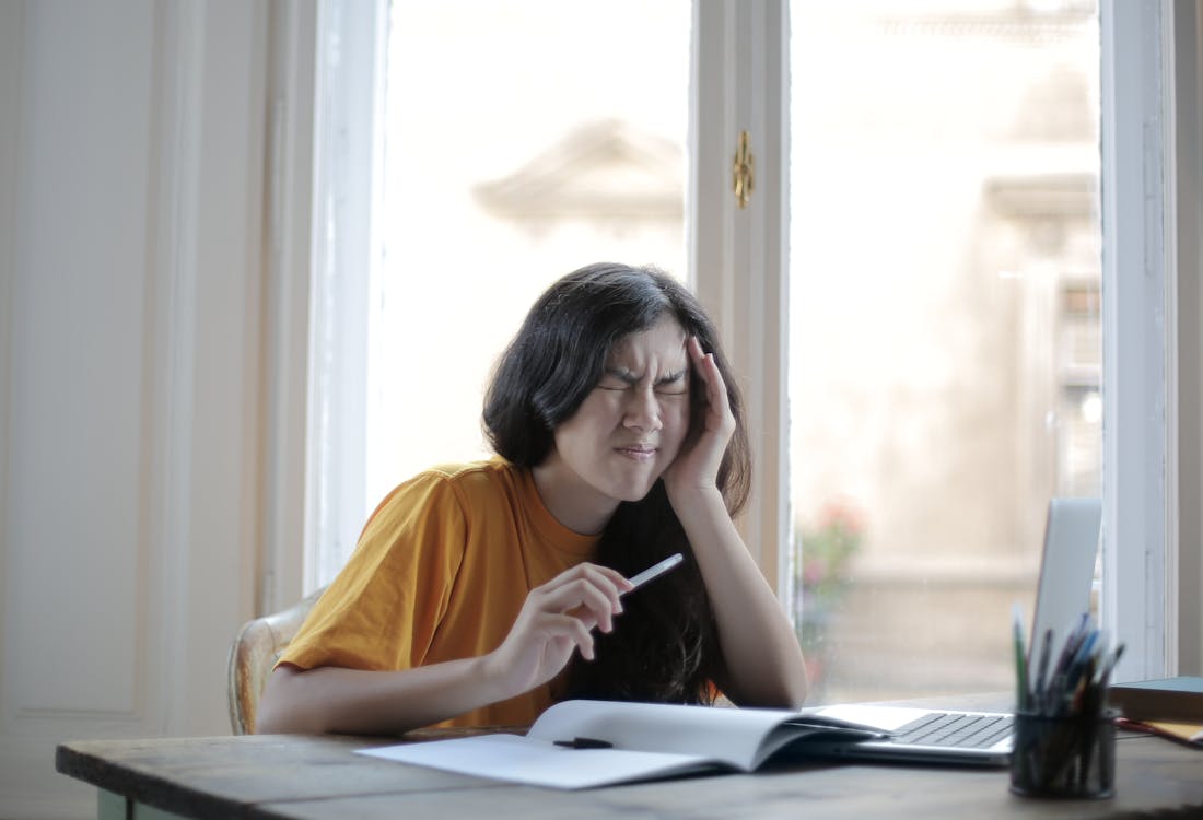 Tired caregiver showing signs of emotional exhaustion and burnout