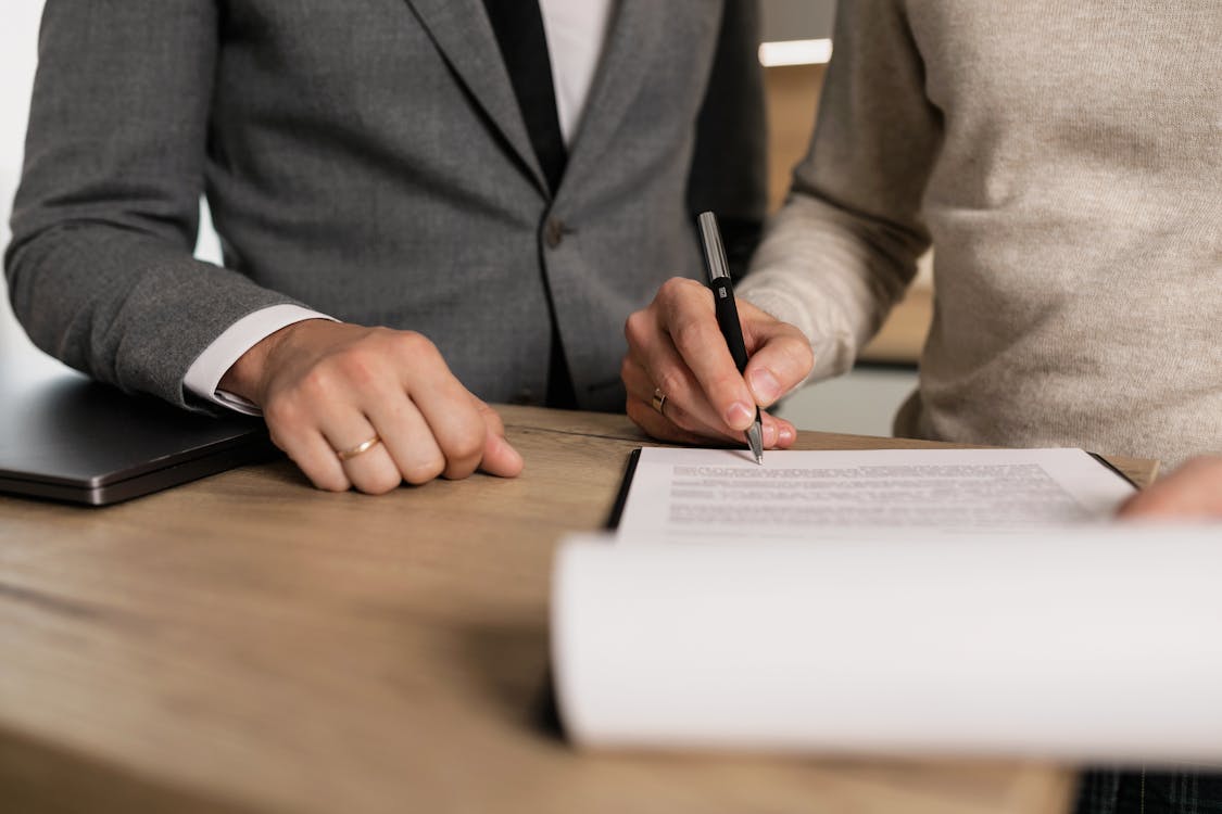 Person reviewing legal documents related to elder abuse protection