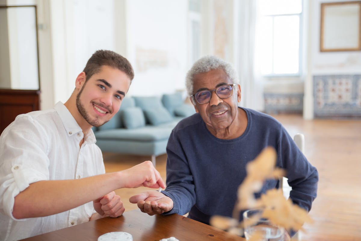 Home healthcare nurse visits elderly patient at home