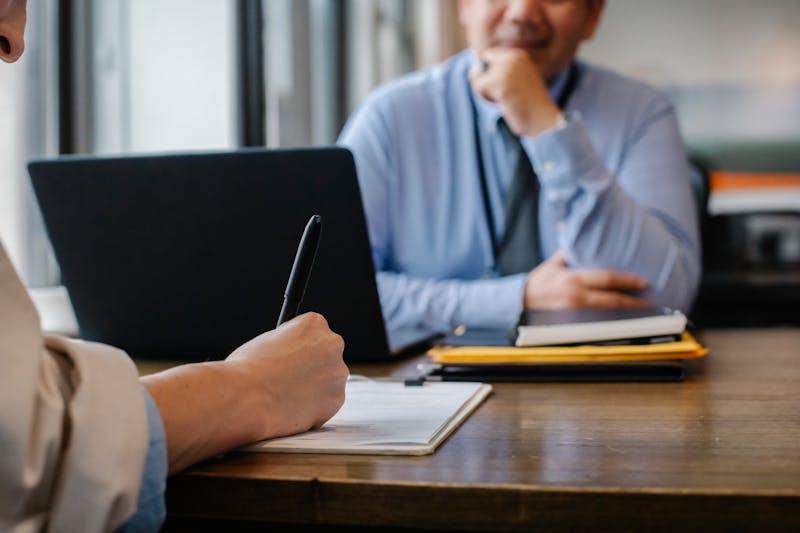 Person reviewing legal documents at a desk