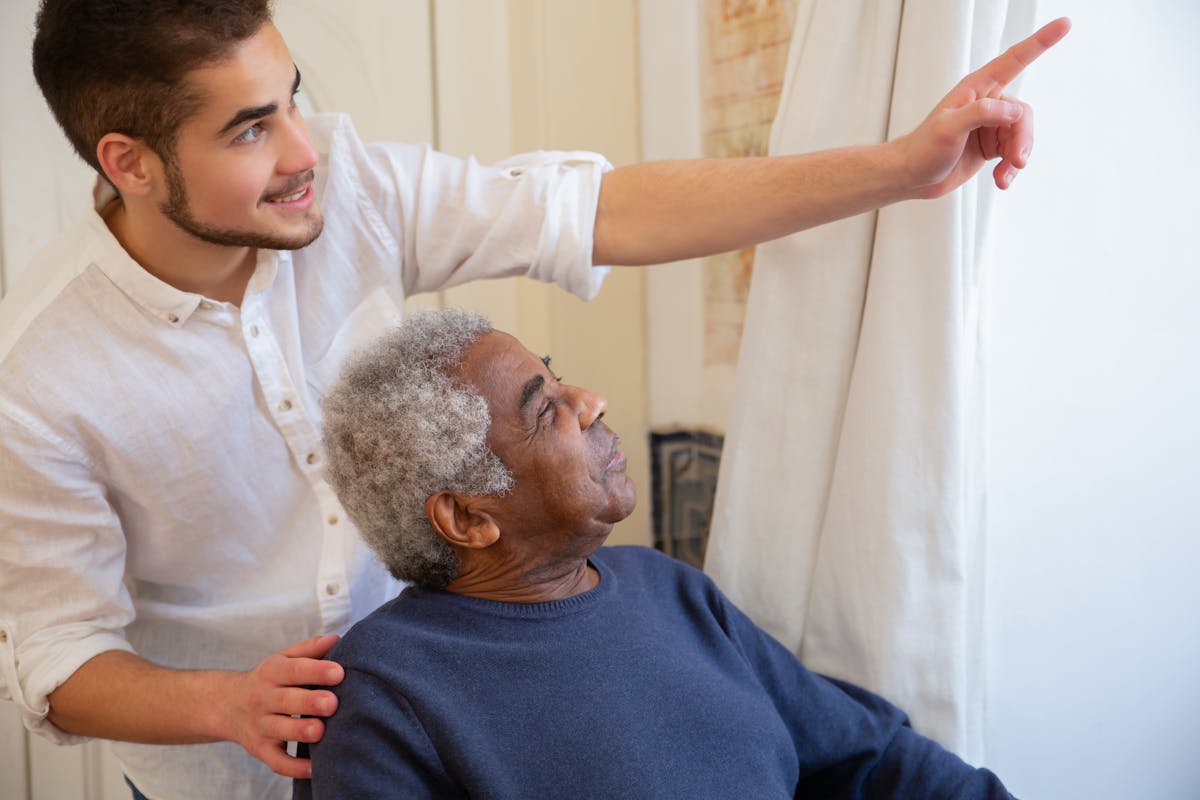 Quality home care worker helping elderly client in Orange County home