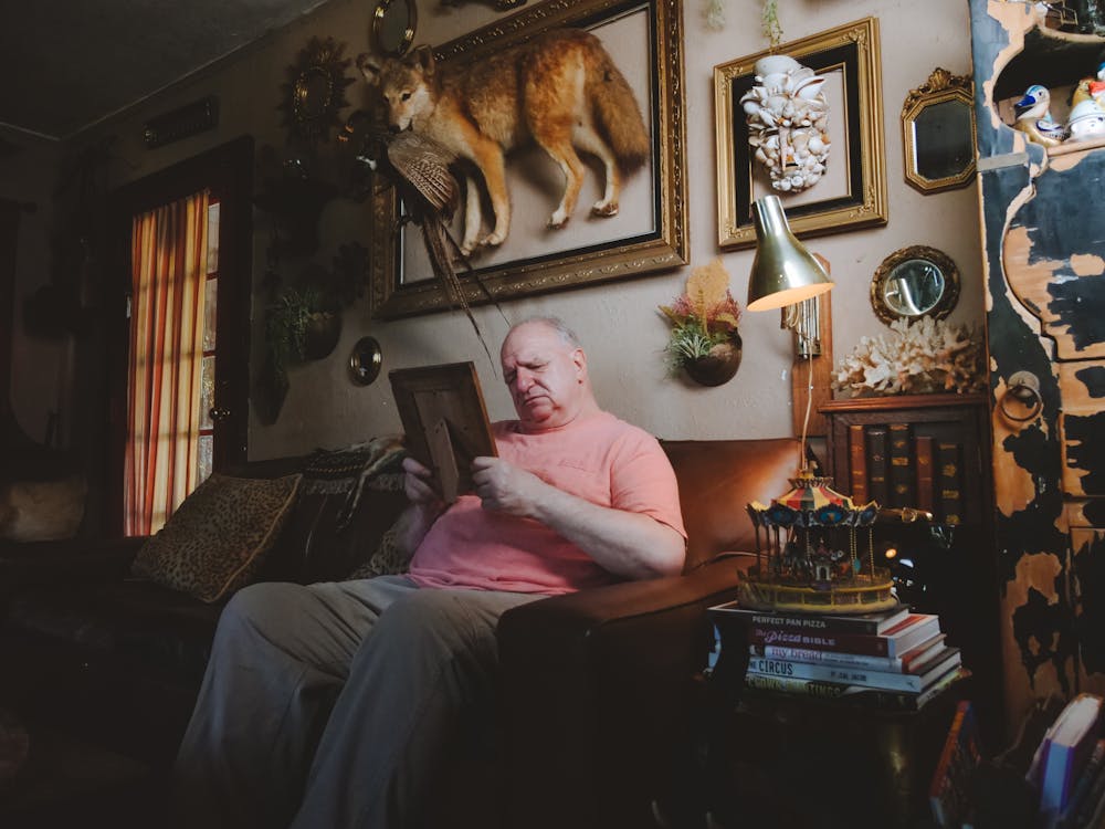 Aging father at home surrounded by memories and familiar comforts — dementia-friendly Father's Day in Orange County
