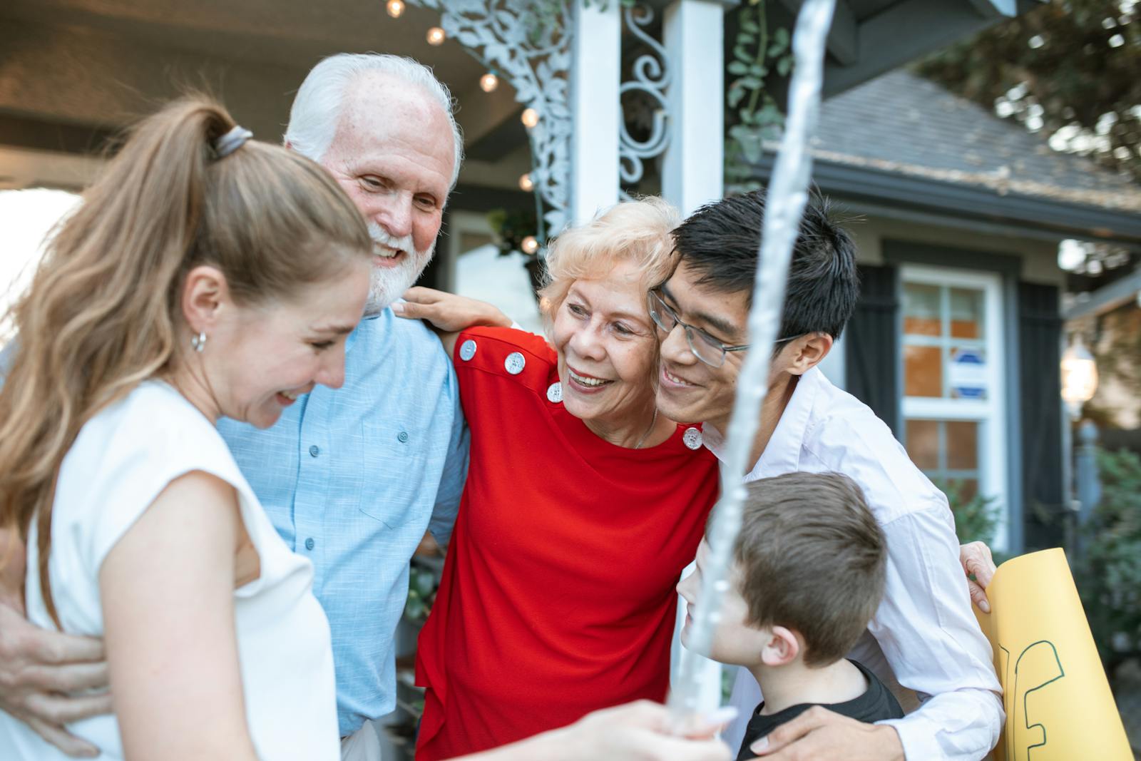 Multigenerational Orange County family gathered at home to discuss IHSS Medi-Cal alternatives