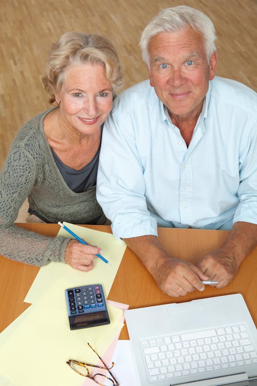 OC senior couple using calculator to add up countable assets before 2026 Medi-Cal asset limit renewal