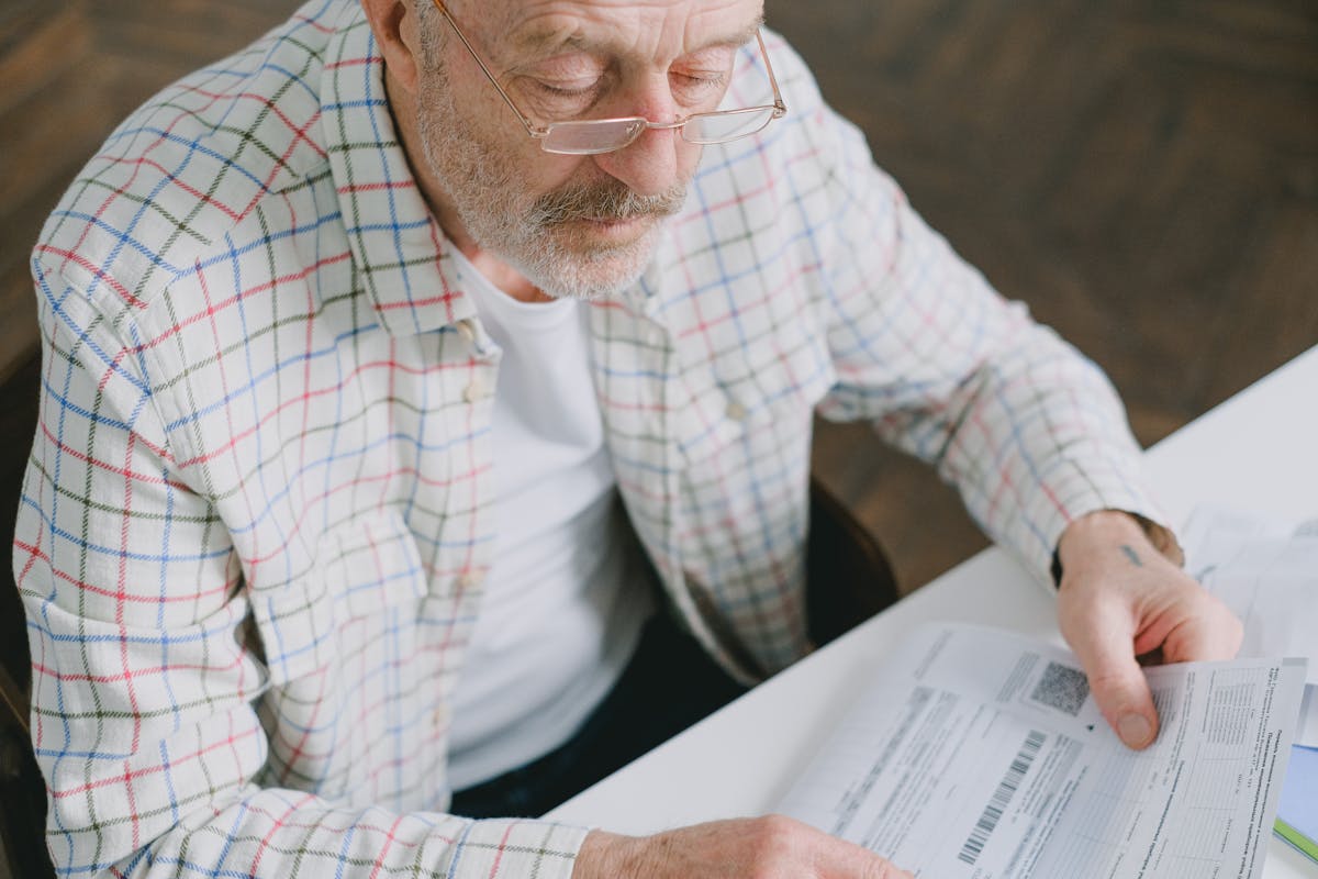 Orange County senior reviewing Medicare home health paperwork at home after the 2026 final rule