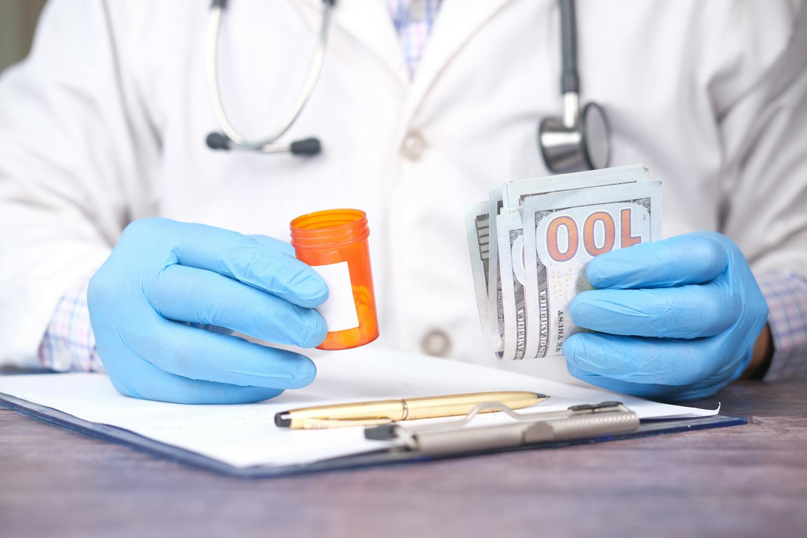 Medicaid policy funding mechanics — doctor holding pills and cash