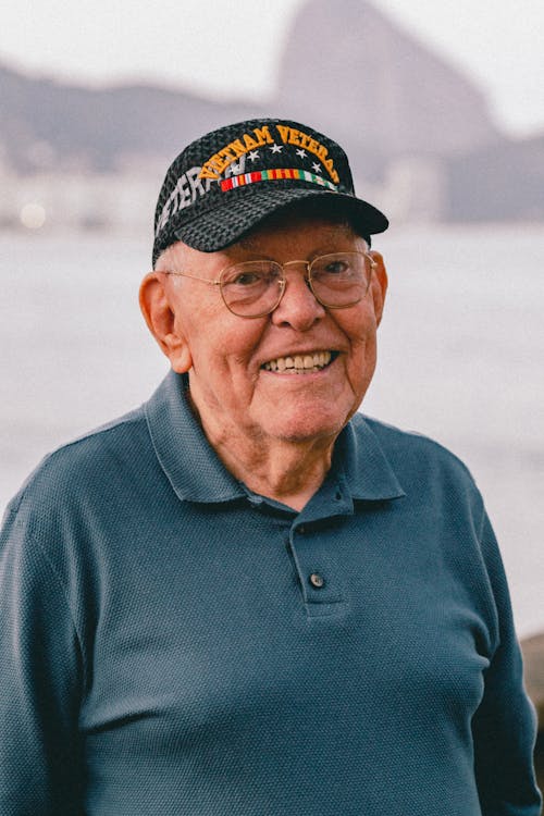 Elderly veteran smiling outdoors — VA Elizabeth Dole Act 2026 in-home care Orange County