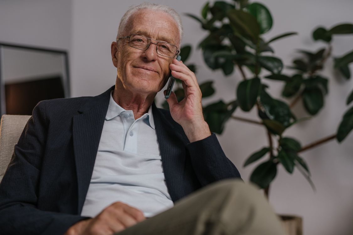 Orange County senior calling Medi-Cal to verify IHSS status after 2026 budget