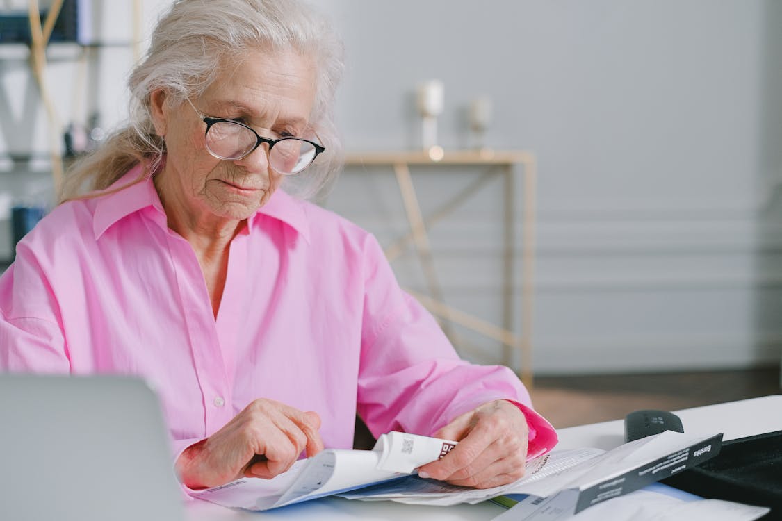 Caregiver providing in-home respite support to elderly woman in Orange County