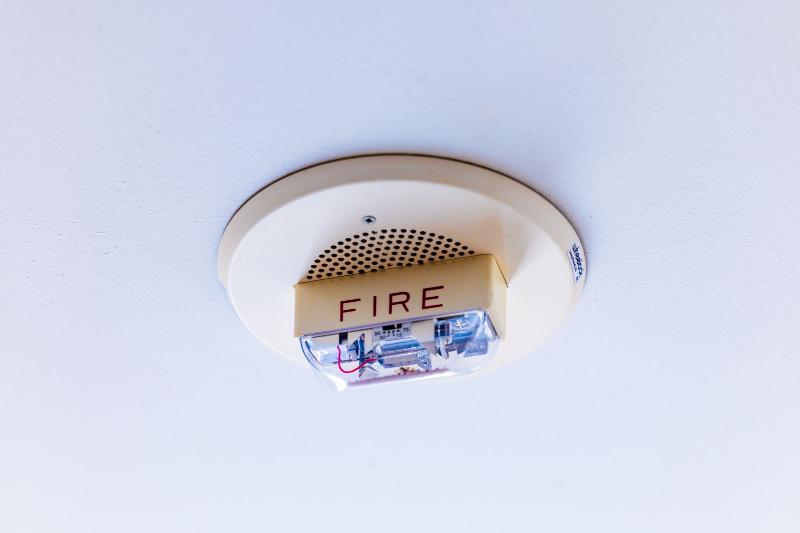 Ceiling-mounted fire alarm in a home